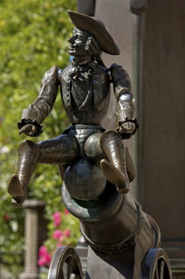 Munchausen figure, The Ride on the Cannonball, Munchausen Fountain by Bonifatius Stirnberg in Bodenwerder, Weserbergland, Lower Saxony, Germany