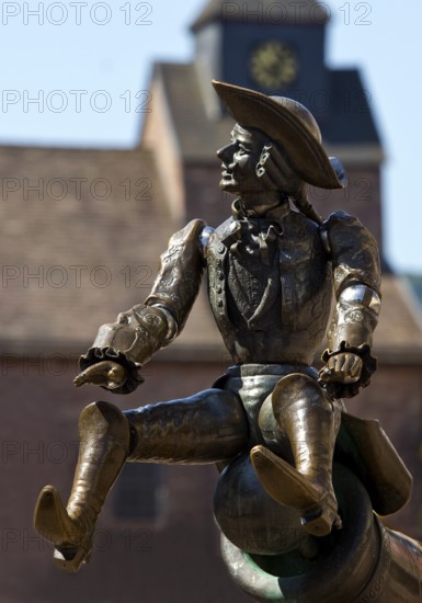Munchausen figure, The Ride on the Cannonball, Munchausen Fountain by Bonifatius Stirnberg in Bodenwerder, Weserbergland, Lower Saxony, Germany