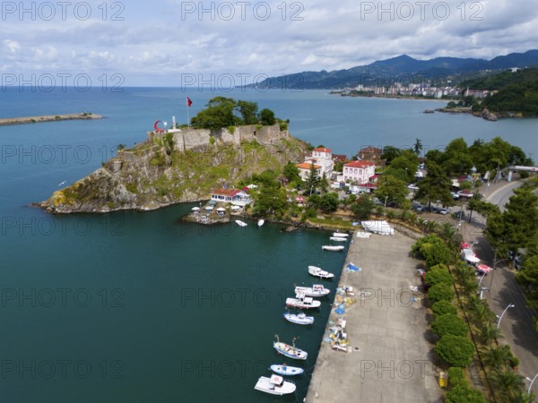 Harbour view with small boats, castle and coastal road next to mountains, aerial view, fortress, castle, Tirebolu, Giresun Province, Black Sea, Turkey
