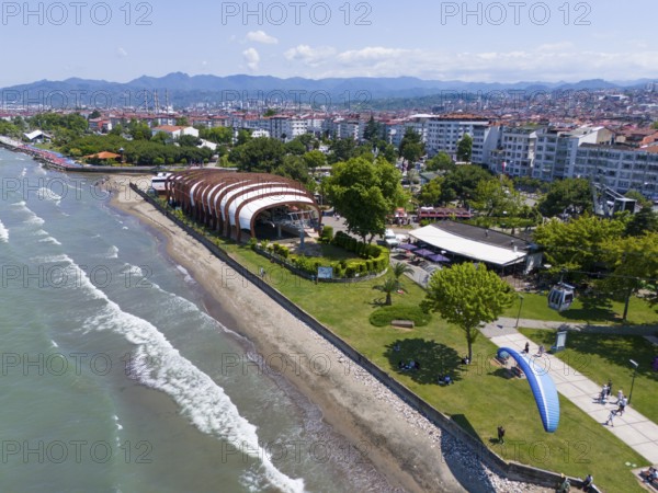 Aerial view of a coastal promenade with modern buildings and undulating beach sections, aerial view, cable car station, Altinordu, Altinordu, Ordu province, Turkey