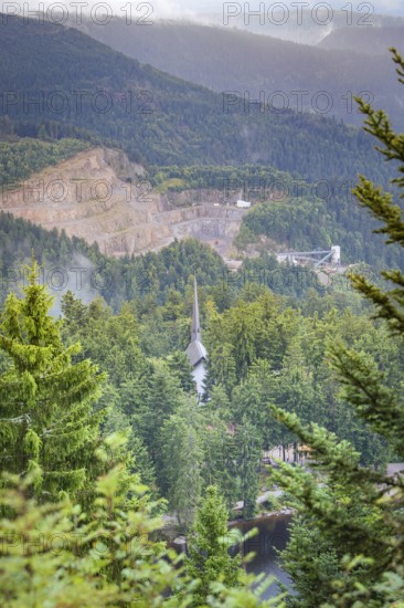 View over a wooded valley with mountain scenery and buildings between the trees, Mummelsee, Seebach, Ortenau District, Black Forest, Germany
