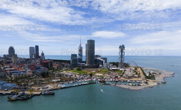 Panorama of a modern city by the sea with striking buildings and an unobstructed view of the water, aerial view, Batumi, Black Sea, Adjara region, Adjara, autonomous republic, Georgia