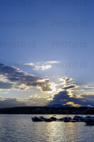 Sunset at the lake near Neuegg am Faaker See, behind Dobratsch, Carinthia, Austria