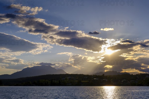 Sunset at the lake near Neuegg am Faaker See, behind Dobratsch, Carinthia, Austria