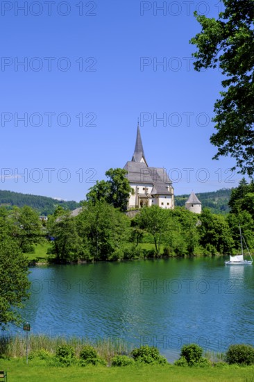 Maria Wörth pilgrimage church, on the southern shore of Lake Lake Wörth, Carinthia, Austria