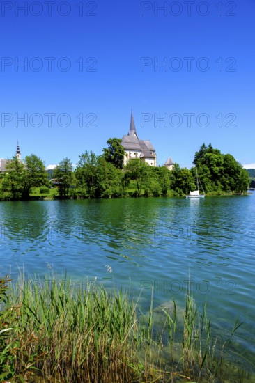 Maria Wörth pilgrimage church, on the southern shore of Lake Lake Wörth, Carinthia, Austria