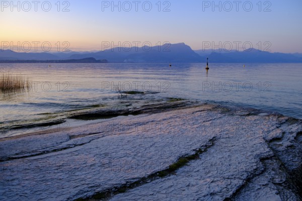 Sunset at Lido delle Grotte, Jamaica Beach, Sirmione on Lake Garda, Veneto, Veneto, Italy