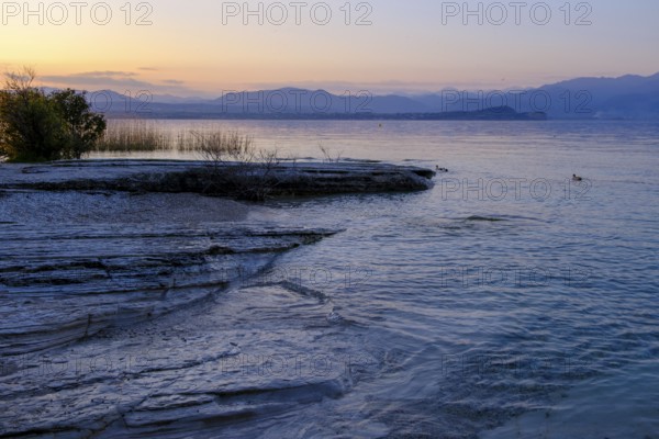 Sunset at Lido delle Grotte, Jamaica Beach, Sirmione on Lake Garda, Veneto, Veneto, Italy
