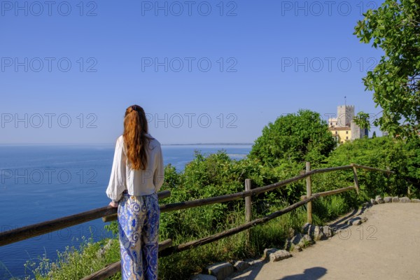 Hikers on the Rilke path at Duino Castle, Castello di Duino Duino, Friuli-Venezia Giulia, Italy