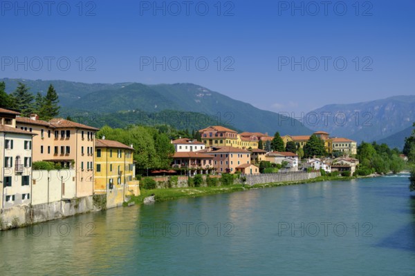 Old town centre on the Brenta, from the Ponte degli Alpini, Bassano del Grappa, Veneto, Italy