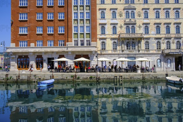 Commercial and residential buildings on the Grand Canal, Borgo Teresiano, Trieste, Adriatic Sea, Julian Friuli, Italy