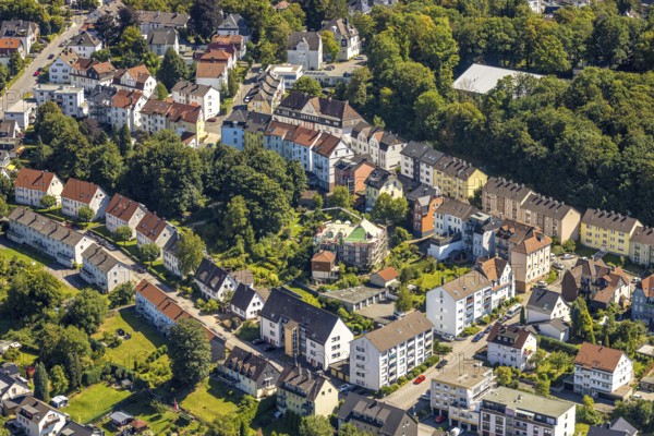 Aerial view, construction site with scaffolding, renovation and refurbishment residential building Bayernstraße 30 in residential area, Lüdenscheid-Stadt, Lüdenscheid, Sauerland, North Rhine-Westphalia, Germany, construction work, construction area, building site, building plots, construction project, construction site, DE, Europe, property tax, real estate, aerial view, aerial photography, aerial photography, Märkischer Kreis, renovation, refurbishment, overview, bird's-eye view, residential area, housing and living, residential area, residential quality, residential neighbourhood, housing estate, residential district, birds-eyes view, overview