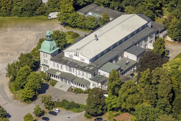 Aerial view, Historic New Schützenhalle Lüdenscheid with tower, event location Schützengesellschaft, Lüdenscheid town, Lüdenscheid, Sauerland, North Rhine-Westphalia, Germany, customs, DE, Europe, events, culture, art, aerial view, aerial photography, aerial photography, Märkischer Kreis, Schützenbruderschaft, Schützengesellschaft, Schützenhalle, Schützenhaus, Schützenverein, theatre, tradition, overview, events, event location, event venue, bird's eye view, birds-eyes view, cultural use, overview