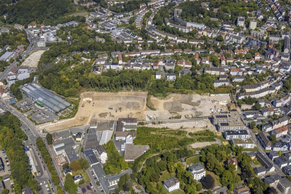 Aerial view, construction site for residential quarter Wiesenstraße and fire station, Lüdenscheid city, Lüdenscheid, Sauerland, North Rhine-Westphalia, Germany, construction work, construction area, building site, building plots, construction project, construction site, fire fighters, fire protection, fire station, DE, Europe, fire station, fire brigade, property tax, real estate, aerial view, aerial photography, aerial photography, Märkischer Kreis, new building, rescue station, overview, bird's-eye view, housing estate, housing and living, residential area, residential quality, residential neighbourhood, housing estate, residential district, birds-eyes view, overview