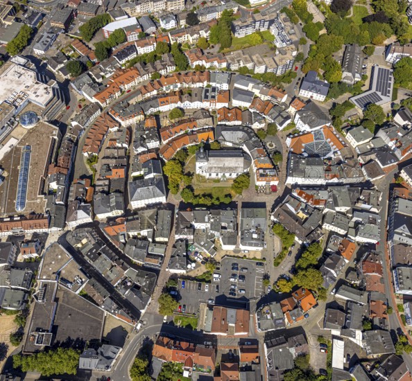 Aerial view, circular residential complex in the city centre with evang. Erlöserkirche, Corneliusstrasse and Grabenstrasse, Lüdenscheid city, Lüdenscheid, Sauerland, North Rhine-Westphalia, Germany, place of worship, DE, Europe, religious community, place of worship, property tax, holy place, real estate, church, parish, denomination, aerial view, aerial photography, aerial photography, Märkischer Kreis, religion, religious site, overview, bird's-eye view, residential area, living and life, residential area, quality of life, residential neighbourhood, housing estate, residential district, birds-eyes view, overview