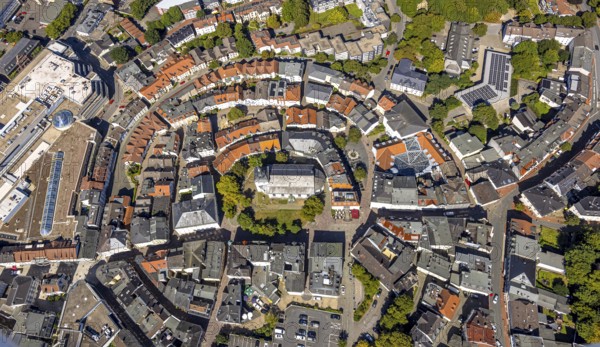 Aerial view, circular residential complex in the city centre with evang. Erlöserkirche, Corneliusstrasse and Grabenstrasse, Lüdenscheid city, Lüdenscheid, Sauerland, North Rhine-Westphalia, Germany, place of worship, DE, Europe, religious community, place of worship, property tax, holy place, real estate, church, parish, denomination, aerial view, aerial photography, aerial photography, Märkischer Kreis, religion, religious site, overview, bird's-eye view, residential area, living and life, residential area, quality of life, residential neighbourhood, housing estate, residential district, birds-eyes view, overview