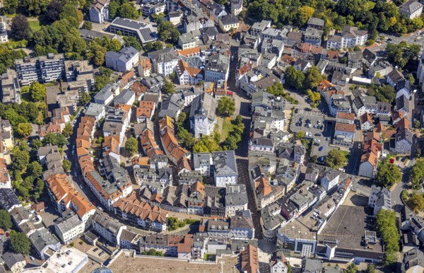 Aerial view, circular residential complex in the city centre with evang. Erlöserkirche, Corneliusstrasse and Grabenstrasse, Lüdenscheid city, Lüdenscheid, Sauerland, North Rhine-Westphalia, Germany, place of worship, DE, Europe, religious community, place of worship, property tax, holy place, real estate, church, parish, denomination, aerial view, aerial photography, aerial photography, Märkischer Kreis, religion, religious site, overview, bird's-eye view, residential area, living and life, residential area, quality of life, residential neighbourhood, housing estate, residential district, birds-eyes view, overview