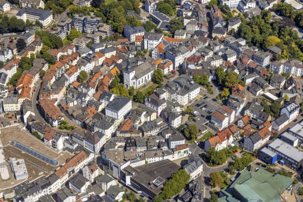 Aerial view, circular residential complex in the city centre with evang. Erlöserkirche, Corneliusstrasse and Grabenstrasse, Lüdenscheid city, Lüdenscheid, Sauerland, North Rhine-Westphalia, Germany, place of worship, DE, Europe, religious community, place of worship, property tax, holy place, real estate, church, parish, denomination, aerial view, aerial photography, aerial photography, Märkischer Kreis, religion, religious site, overview, bird's-eye view, residential area, living and life, residential area, quality of life, residential neighbourhood, housing estate, residential district, birds-eyes view, overview