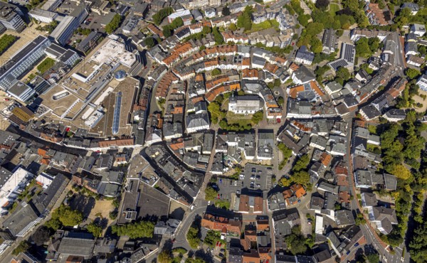 Aerial view, circular residential complex in the city centre with evang. Erlöserkirche, Corneliusstrasse and Grabenstrasse, Lüdenscheid city, Lüdenscheid, Sauerland, North Rhine-Westphalia, Germany, place of worship, DE, Europe, religious community, place of worship, property tax, holy place, real estate, church, parish, denomination, aerial view, aerial photography, aerial photography, Märkischer Kreis, religion, religious site, overview, bird's-eye view, residential area, living and life, residential area, quality of life, residential neighbourhood, housing estate, residential district, birds-eyes view, overview