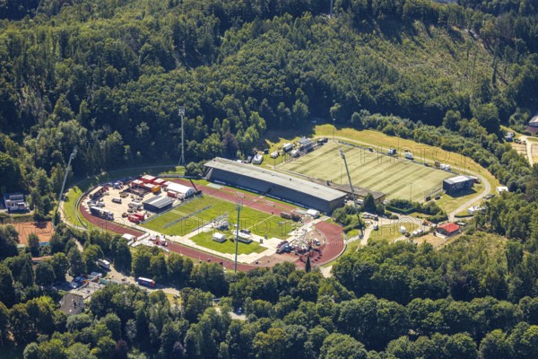 Aerial view, construction site and renovation of the Nattenberg stadium, Rot-Weiß Lüdenscheid, Lüdenscheid city, Lüdenscheid, Sauerland, North Rhine-Westphalia, Germany, construction work, construction area, building site, building plots, construction project, construction site, DE, renovation, Europe, football, football field, football stadium, football club, aerial view, aerial photography, aerial photography, Märkischer Kreis, renovation, refurbishment, sports, sports facility, sports field, sports club, overview, bird's-eye view, overview