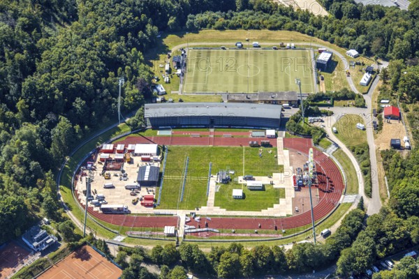 Aerial view, construction site and renovation of the Nattenberg stadium, Rot-Weiß Lüdenscheid, Lüdenscheid city, Lüdenscheid, Sauerland, North Rhine-Westphalia, Germany, construction work, construction area, building site, building plots, construction project, construction site, DE, renovation, Europe, football, football field, football stadium, football club, aerial view, aerial photography, aerial photography, Märkischer Kreis, renovation, refurbishment, sports, sports facility, sports field, sports club, overview, bird's-eye view, overview