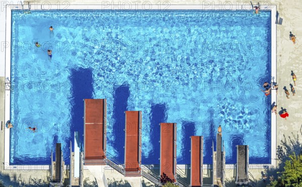 Aerial view, open-air swimming pool Nattenberg, swimming pool with bathers and eight diving boards, Lüdenscheid town, Lüdenscheid, Sauerland, North Rhine-Westphalia, Germany, bathing establishment, bathing resort, DE, Europe, shapes and colours, open-air swimming pool, leisure activities, aerial view, aerial photography, aerial photography, Märkischer Kreis, swimming pool, swimming pool, overview, bird's eye view, birds-eyes view, overview