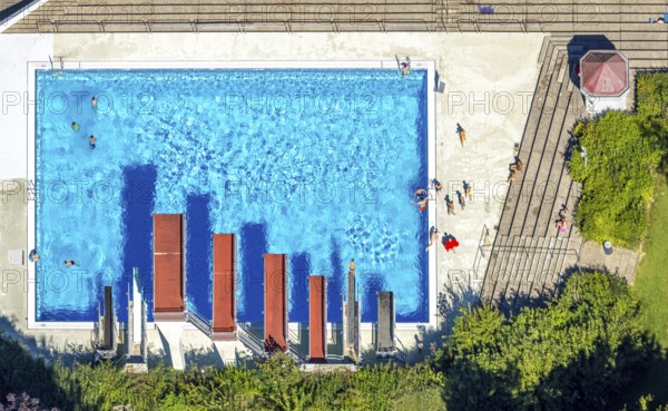 Aerial view, open-air swimming pool Nattenberg, swimming pool with bathers and eight diving boards, Lüdenscheid town, Lüdenscheid, Sauerland, North Rhine-Westphalia, Germany, bathing establishment, bathing resort, DE, Europe, shapes and colours, open-air swimming pool, leisure activities, aerial view, aerial photography, aerial photography, Märkischer Kreis, swimming pool, swimming pool, overview, bird's eye view, birds-eyes view, overview