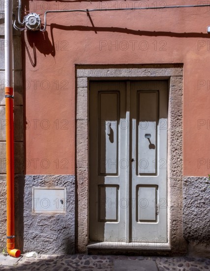 Sardinia, house with picturesque door, Bosa, Europe, Province of Oristano, Italy, old, architecture, detail, entrance, colours, facade, window, building, house, culture, travel, sightseeing, summer, sun, town, street, urban, daylight, tourism, urban, residential, charming, decorative, historic, picturesque, picturesque town, picturesque door, Mediterranean, picturesque, southern European, traditional