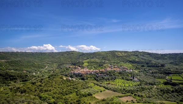 Sardinia, Village view and houses surrounded by meadows and fields, blue sky with clouds, Modolo, Beluga (sturgeon), Province of Oristano, Italy, Architecture, Exterior view, Farm, Trees, Village, Relaxation, Fields, Peace, Green, Sky, Horizon, Houses, idyll, idyllic, country, landscape, nature, local view, panorama, settlement, sightseeing, summer, scenic, daylight, tourism, environment, holiday, vastness, meadows, residential area, residential houses, clouds, blue sky, rural, picturesque, mediterranean, quiet, vegetation