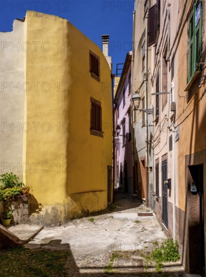 Sardinia, alley with picturesque house and window, Bosa, Europe, Oristano province, Italy, old town, antique, architecture, atmosphere, exterior, flowers, detail, village, conservation, colours, facade, window, shutters, photography, alley, building, house, sky, cobblestone, culture, travel, sightseeing, sun, alleyway, scenery, daylight, tourism, holiday, charming, decoration, narrow, historical, picturesque, mediterranean, traditional