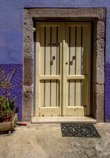 Sardinia, house with picturesque door, Bosa, Europe, Province of Oristano, Italy, old town, architecture, detail, entrance, bay, colours, facade, window, alley, building, history, house, sky, culture, residence, sightseeing, summer, city, stone, structure, daylight, tourism, doors, characteristic, charming, decorative, historic, Italian, picturesque, picturesque door, Mediterranean, traditional, warm climate