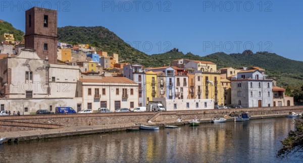 Sardinia, Town view, Residential houses on the river Temo and church tower, Bosa, Europe, Province of Oristano, Italy, Old Town, Architecture, View, Village, Relaxation, Exploration, Flora, River, Riverbank, Sky, Horizon, Idyll, Art Nouveau, Church tower, cultural heritage, coastal town, landscape, nature, travel, sightseeing, summer, townscape, scenic, day, Temo, tourism, urban, water, residential, destination, historic buildings, Italian, picturesque, Mediterranean, picturesque, regional architecture