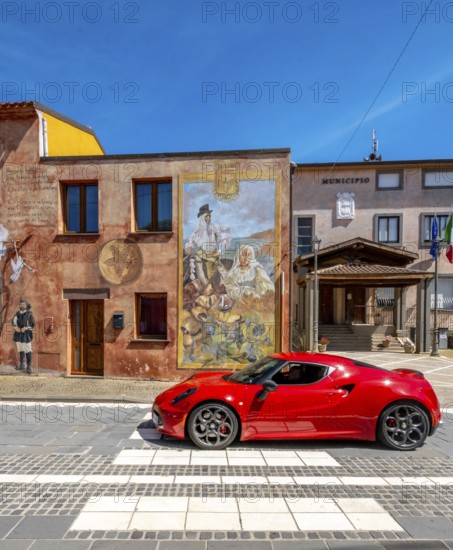 Sardinia, house with mural, Sardinia landmark, red sports car, Tinnura, Europe, Oristano province, Italy, architecture, attraction, car, exterior, detail, village, facade, photography, building, house, culture, art, artwork, landscape, murals, travel, sight, sightseeing, summer, street, tourism, urban, mural, decoration, European, creative, rural, picturesque, picturesque village, Mediterranean, Mediterranean flair, contemporary