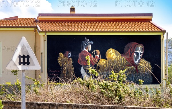 Sardinia, house with murals, Sardinian landmark, Tinnura, Europe, Province of Oristano, Italy, architecture, exterior, detail, facade, building, craft, house, identity, creativity, culture, art, murals, travel, sight, sightseeing, city, symbolism, tourism, urban, mural, decoration, colourful, historical, artistic, picturesque, Mediterranean, regional, traditional