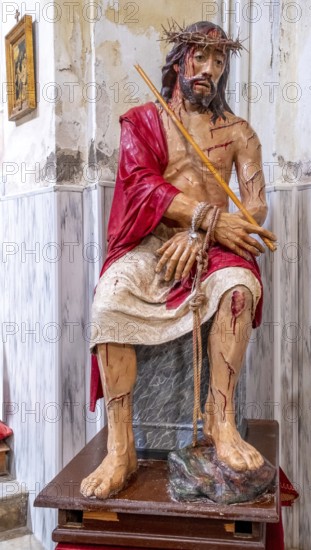 Sardinia, maltreated and bleeding Jesus figure, crown of thorns, Bosa, Europe, Province of Oristano, Italy, devotion, attention, expression, Christianity, representation, emotion, figure, faith, saviour, Jesus figure, art, suffering, sacrifice, Passion story, pain, sightseeing, sculpture, symbol, symbolism, tourism, tradition, devout, figurative, pictorial, bleeding, maltreated, historical, iconic, inspiring, catholic, powerful, religious, sacred, sculptural, spiritual, deeply touching