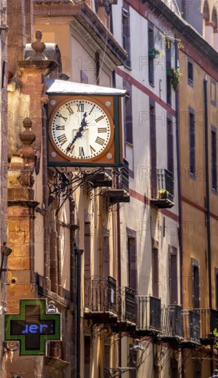 Sardinia, historical clock on a house wall, Bosa, Europe, Province of Oristano, Italy, old town, architecture, attraction, outdoor, detail, exploration, facade, building, history, house wall, travel destination, sightseeing, summer, city view, street, day, tourism, tradition, clockwork, urban, landmark, timekeeping, clock face, old building, antique, charming, decoration, historical architecture, historical clock, Italian, cultural, picturesque, Mediterranean, stone