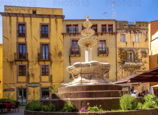 Sardinia, artistic fountain with three levels on the Piazza Costituzione, house wall with Erboristeria shop, Bosa, Europe, Province of Oristano, Italy, old town, architecture, detail, heritage, Erboristeria, pedestrian, building, shop, house wall, culture, art, shop, passer-by, Piazza Costituzione, destination, sight, sightseeing, summer, fountain, city, city centre, daylight, tourism, urban, water, everyday, decorative, three levels, historic, Italian, artistic, Mediterranean, stone, traditional, public space