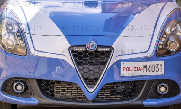 Sardinia, Alfa Romeo police car and police sign Polizia M4031, Bosa, Europe, Province of Oristano, Italy, Alfa Romeo, architecture, car, automobile, exterior, service, emergency vehicle, vehicle, building, infrastructure, M4031, order, law enforcement, police, police sign, police car, Polizia, security, sightseeing, state power, street, urban, scene, daytime, tourism, transport, environment, traffic, European, Italian, southern Europe