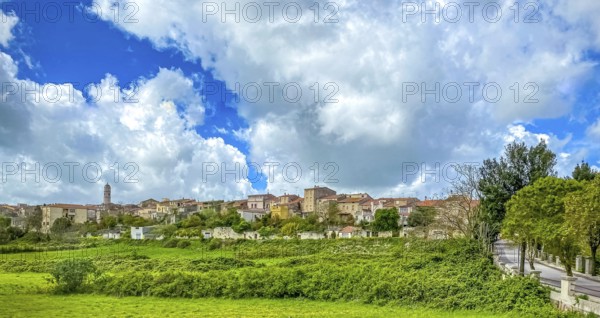 Sardinia, town view, town wall and church tower of Thiesi, blue sky with clouds, Thiesi, Europe, province of Sassari, Italy, architecture, exterior view, village, building, sky, church, church tower, culture, cultural heritage, landscape, travel, religion, sight, sightseeing, summer, town, town view, town wall, structure, daylight, tourism, tradition, holiday, clouds, blue sky, historical, Italian, rural, picturesque, Mediterranean, regional