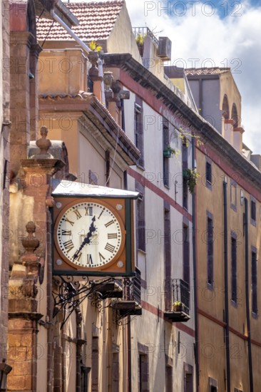 Sardinia, historical clock on a house wall, Bosa, Europe, Province of Oristano, Italy, old, architecture, exterior, details, village, building, history, house wall, culture, idyllic place, journey, sight, sightseeing, town, stone wall, structure, tourism, clock hand, vintage, landmark, wall, time display, time measurement, antique, decoration, historic, historical clock, Italian, Mediterranean, Mediterranean style, traditional, aesthetics