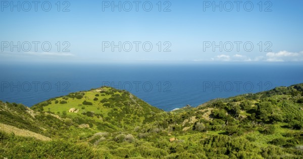 Sardinia, Mountainous coastal landscape by the sea, blue sky with clouds, Bosa, Europe, Province of Oristano, Italy, View, Mountains, Mountainous, Recreation, Exploration, Rocks, Geography, Sky, Hills, Idyllic, Coast, Coastal landscape, Landform, Sea, Nature, Panorama, Destination, Sightseeing, Scenic, Tourism, Shore, Holiday, Water, Clouds, Blue sky, European, Scenic, Picturesque, Mediterranean