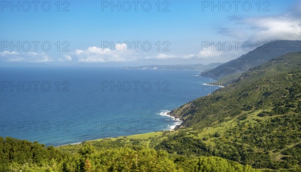 Sardinia, mountainous coastal landscape by the sea, blue sky with clouds, Bosa, Europe, Province of Oristano, Italy, view, mountains, mountainous coastal landscape, recreation, rocks, sky, horizon, cultural landscape, coast, landscape, sea, nature, panorama, travel, sightseeing, summer, scenic, day, tourism, holiday, water, clouds, blue sky, peaceful, geographical, Italian region, picturesque, Mediterranean, untouched
