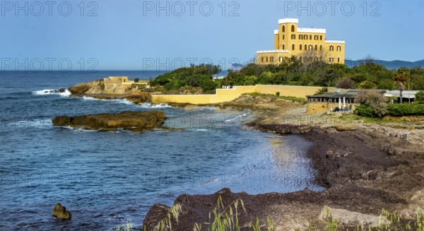 Sardinia, coastal wall, coast and beach with Villa Las Tronas Hotel and Spa, Alghero, Europe, Province of Sassari, Italy, architecture, exterior, relaxation, rocks, flora, building, sky, hotel, hotel complex, coast, coastline, landscape, luxury, sea view, Mediterranean, nature, travel, sightseeing, summer, spa, beach, daylight, tourism, accommodation, holiday, holiday region, Villa Las Tronas, water, elegant, exclusive, historical, Mediterranean, vegetation