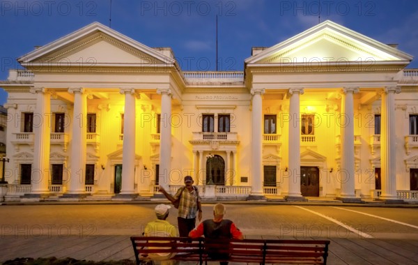 Neoclassical Marti Library in the centre of Santa Clara, Biblioteca Marti, Streetlife in the city centre of Santa Clara at the Parque de Santa Clara, Santa Clara, Cuba, Villa Clara