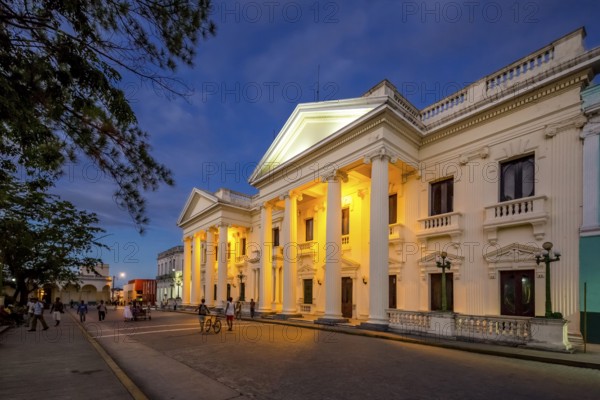 Neoclassical Marti Library in the centre of Santa Clara, Biblioteca Marti, Streetlife in the city centre of Santa Clara at the Parque de Santa Clara, Santa Clara, Cuba, Villa Clara