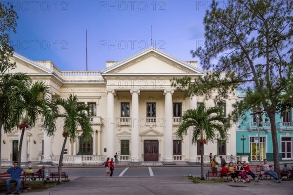 Neoclassical Marti Library in the centre of Santa Clara, Biblioteca Marti, Streetlife in the city centre of Santa Clara at the Parque de Santa Clara, Santa Clara, Cuba, Villa Clara