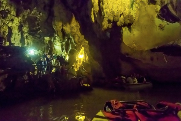 Tourists in a boat on the underground rivers in the caves of the Indios, Cueva del Indio, underground caves with a watercourse river accessible to tourists, Viñales, Cuba, Central America, Cuba, Caribbean