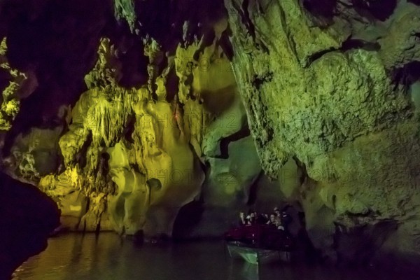 Tourists in a boat on the underground rivers in the caves of the Indios, Cueva del Indio, underground caves with a watercourse river accessible to tourists, Viñales, Cuba, Central America, Cuba, Caribbean