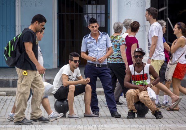 Young Cuban policeman with teenagers, La Habana, Cuba, Caribbean, Central America, Cuba, Europe, aerial view, birds-eyes view, aerial photography, aerial photography, overview, bird's eye view