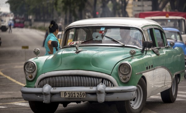 Green vintage car in street scene, Old American street cruiser on the streets of Havana, Taxi, La Habana, Havana, Cuba, Cuba, Europe, aerial view, birds-eyes view, aerial photography, aerial photography, overview, bird's eye view